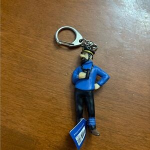 Blue and Black Keychain Figure